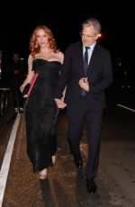 CHRISTINA HENDRICKS and George Bianchini Arrives at a Holiday Party in Brentwood 12/03/2022