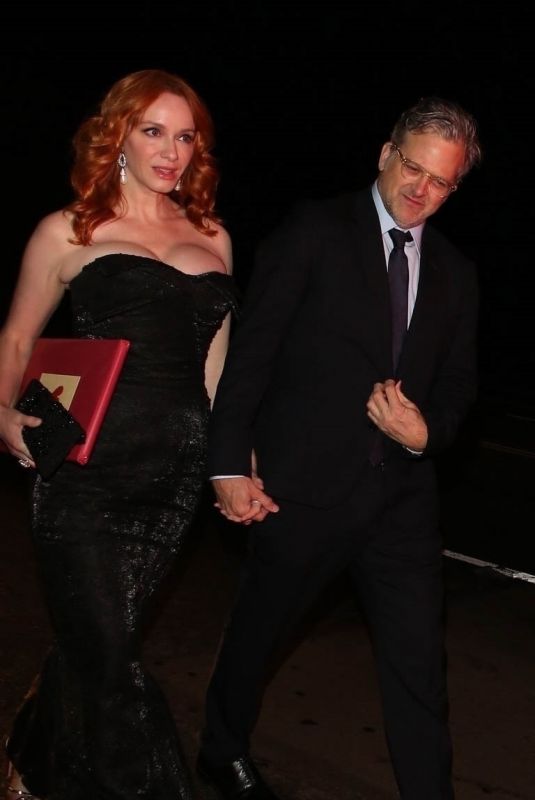 CHRISTINA HENDRICKS and George Bianchini Arrives at a Holiday Party in Brentwood 12/03/2022