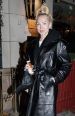 CHRISTINE QUINN and Christian Richard Leaves Their Hotel in Paris 12/14/2022