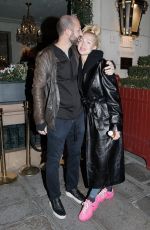 CHRISTINE QUINN and Christian Richard Leaves Their Hotel in Paris 12/14/2022
