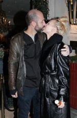 CHRISTINE QUINN and Christian Richard Leaves Their Hotel in Paris 12/14/2022