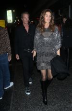 CINDY CRAWFORD and Rande Gerber Arrives at Celine at The Wiltern Fashion Show in Los Angeles 12/08/2022