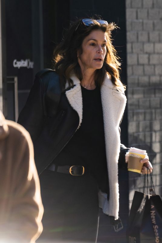 CINDY CRAWFORD and Rande Gerber Out in New York 12/18/2022