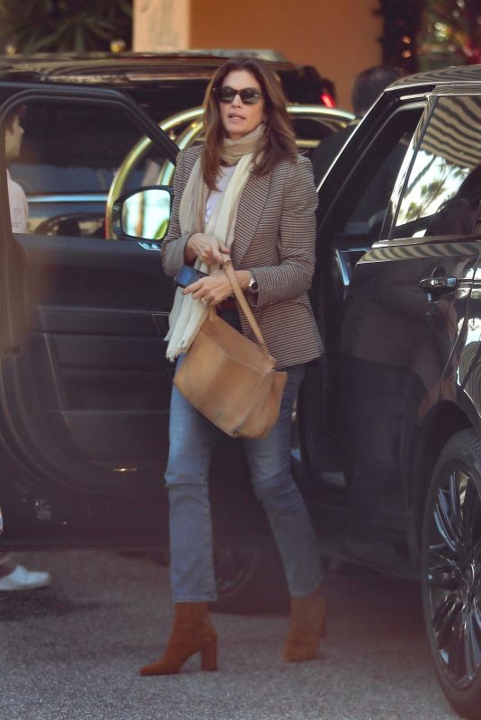 CINDY CRAWFORD Arrives at Beverly Hills Hotel 12/03/2022