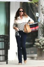 CINDY CRAWFORD Vsits Her Local Tailor in Beverly Hills 11/30/2022