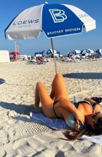 CLAUDIA ROMANI at a Beach in Miami 12/14/2022