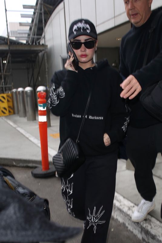 DEMI LOVATO at LAX Airport in Los Angeles 11/30/2022