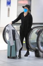 ELIZABETH BANKS Arrives at Los Angeles International Airport 12/02/2022