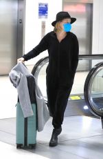 ELIZABETH BANKS Arrives at Los Angeles International Airport 12/02/2022