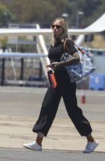 EMILY BLUNT Arrives Back in Sydney 12/27/2022