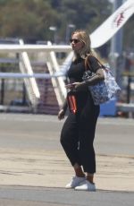 EMILY BLUNT Arrives Back in Sydney 12/27/2022