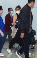 EVANGELINE LILLY Arrives at Guarulhos Airport in Sao Paulo 11/30/2022