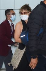 EVANGELINE LILLY Arrives at Guarulhos Airport in Sao Paulo 11/30/2022