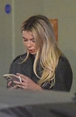 GEORGIA TOFFOLO Out Smoking After Meeting with Friends at Soho House in London 12/21/2022