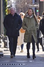 GEORGINA CHAPMAN Out with Her Father Brian in New York 12/28/2022