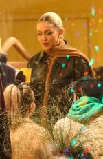 GIGI and BELLA HADID and Marc Kalman Visits Guest In Residence Clothing Store in Aspen 12/18/2022