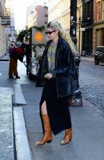GIGI HADID Arrives at Her Guest In Residence Official by Gigi Hadid Pop-up in New York 12/09/2022