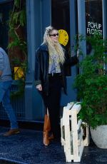 GIGI HADID Arrives at Her Guest In Residence Official by Gigi Hadid Pop-up in New York 12/09/2022