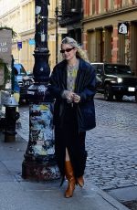 GIGI HADID Arrives at Her Guest In Residence Official by Gigi Hadid Pop-up in New York 12/09/2022