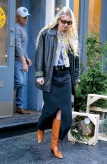 GIGI HADID Leaves Guest in Residence Pop Up Store in New York 12/09/2022