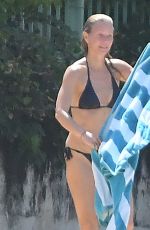 GWYNETH PALTROW and APPLE MARTIN in Bikinis at a Beach in Barbados 12/24/2022