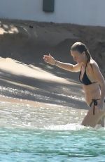 GWYNETH PALTROW and APPLE MARTIN in Bikinis at a Beach in Barbados 12/24/2022