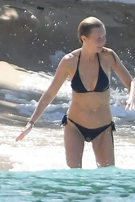 GWYNETH PALTROW and APPLE MARTIN in Bikinis at a Beach in Barbados 12/24/2022