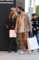 HEIDI KLUM and Tom Kaulitz Shopping at Yves Saint Laurent on Rodeo Drive in Beverly Hills 12/15/2022