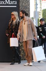HEIDI KLUM and Tom Kaulitz Shopping at Yves Saint Laurent on Rodeo Drive in Beverly Hills 12/15/2022