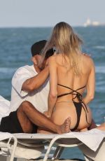 JOY CORRIGAN in Bikini at a Beach in Miami 12/03/2022