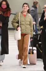 KATIE HOLMES and SURI CRUISE Arrives at Newark Airport in New Jersey 12/27/2022