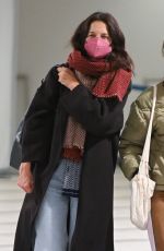 KATIE HOLMES and SURI CRUISE Arrives at Newark Airport in New Jersey 12/27/2022