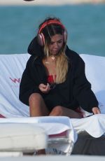 LIBBIE MUGRABI Relaxes at a Beach 12/21/2022