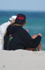 LIBBIE MUGRABI Relaxes at a Beach 12/21/2022