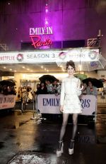 LILY COLLINS Arrives at Emily in Paris Premiere at Paris Theater in New York 12/15/2022