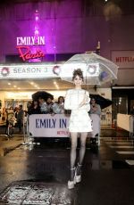 LILY COLLINS Arrives at Emily in Paris Premiere at Paris Theater in New York 12/15/2022