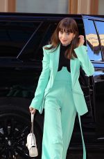 LILY COLLINS Leaves Drew Barrymore Show in New York 12/14/2022