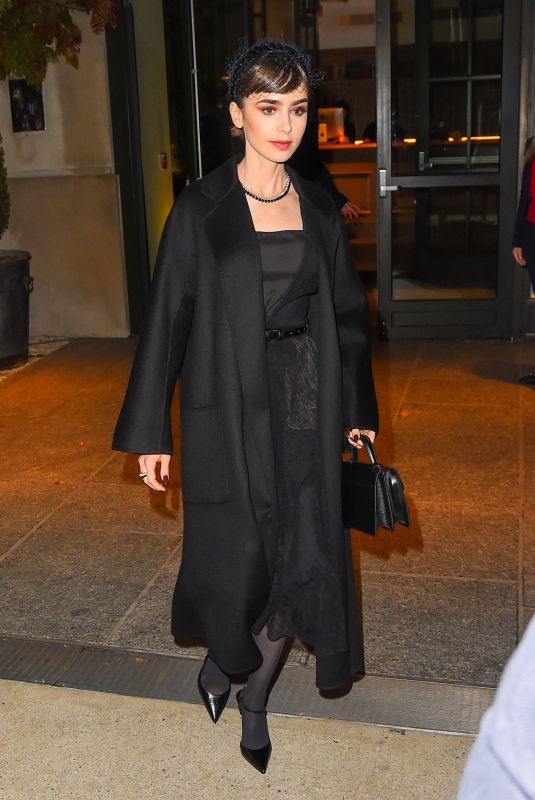 LILY COLLINS Leaves Her Hotel in New York 12/12/2022
