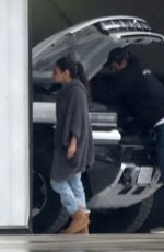MILA KUNIS Returns Home From a Trip to Ashton
