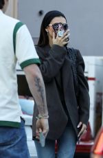 NICOLA PELTZ and Brooklyn Beckham Out on Eearly Holiday Shopping in Beverly Hills 12/07/2022