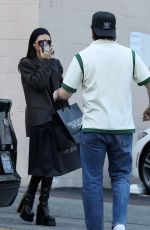NICOLA PELTZ and Brooklyn Beckham Out on Eearly Holiday Shopping in Beverly Hills 12/07/2022