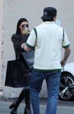 NICOLA PELTZ and Brooklyn Beckham Out on Eearly Holiday Shopping in Beverly Hills 12/07/2022