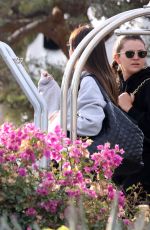 NICOLA PELTZ, Brooklyn Beckham and SELENA GOMEZ Arrives at a Private Airport in Los Cabos 12/29/2022