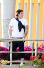 NICOLA PELTZ, Brooklyn Beckham and SELENA GOMEZ Arrives at a Private Airport in Los Cabos 12/29/2022