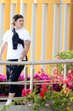 NICOLA PELTZ, Brooklyn Beckham and SELENA GOMEZ Arrives at a Private Airport in Los Cabos 12/29/2022