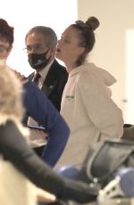 NINA AGDAL Arrives at LAX Airport in Los Angeles 12/08/2022