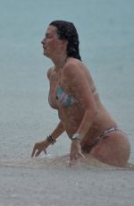 RHE DURHAM in Bikini at a Beach in Barbados 12/24/2022