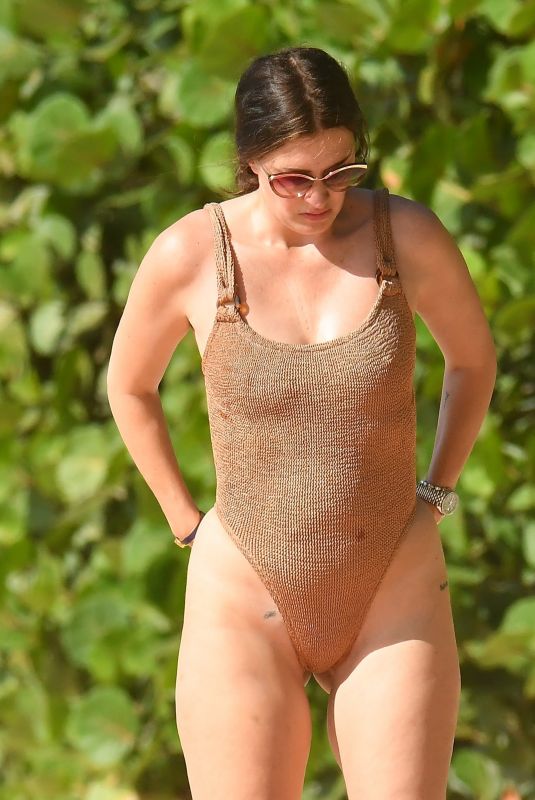 RHE DURHAM in Swimsuit at a Beach in Barbados 12/23/2022