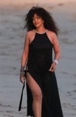 RIHANNA at a Chanel Photoshoot on Malibu Beach 12/16/2022