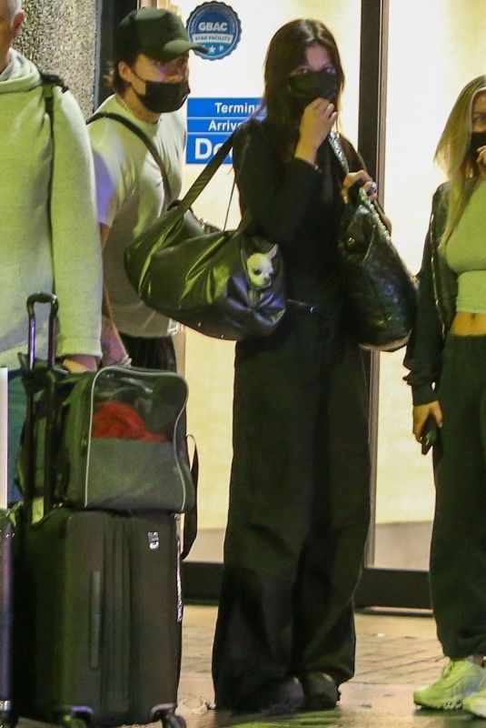 SELENA GOMEZ, NICOLA PELTZ and RAQUELLE STEVENS at Miami Airport 11/29/2022